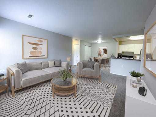 a living room with a couch and two chairs