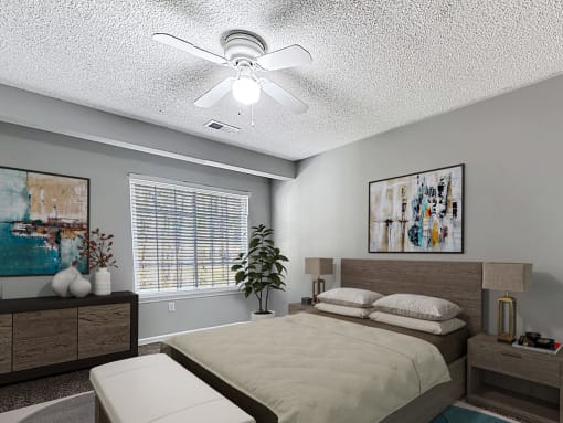 a bedroom with a bed and a ceiling fan