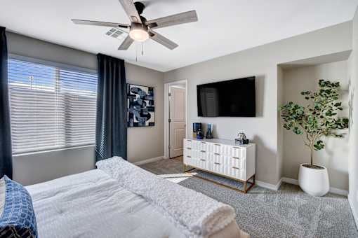 Bedroom With TV at Copper Creek Apartments, Nevada, 89123