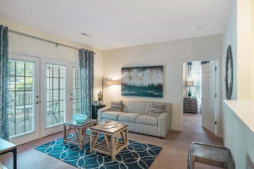 a living room with a couch and a table