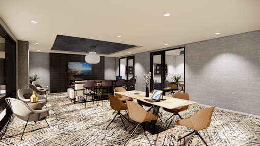 A modern dining room with a large table and chairs.