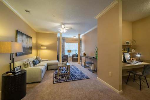 a living room with a couch and a table