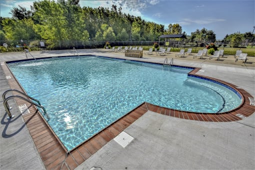 take a dip in the resort style pool at Evergreen Luxury Apartments, Merrillville, IN
