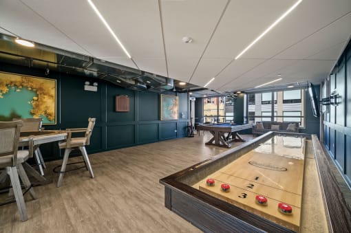 a games room with a ping pong table and a foosball table at Lakeview 3200 Apartments, Illinois, 60657