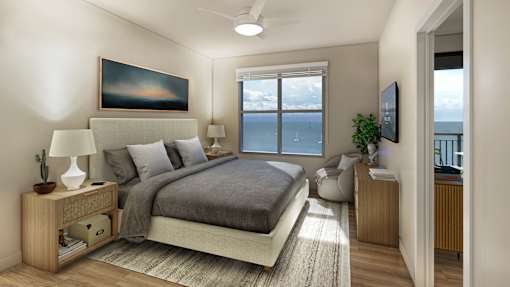A bedroom with a large bed and a painting on the wall.