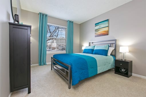 Bedroom with bed, lamps at Brookdale Lakes, Illinois, 60563