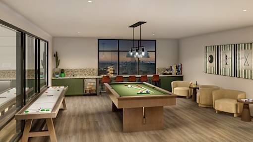 A room with a pool table and a foosball table.