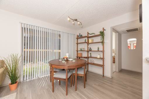 Fusion 35 dining room with a wooden table and chairs.