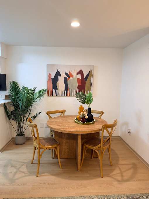 Fusion Crossroads dining room with a wooden table and chairs.