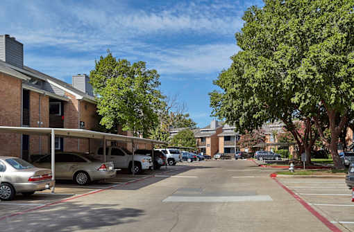 An onsite parking lot with cars parked in it at 1601 Eastchase Pkwy in Fort Worth, TX.