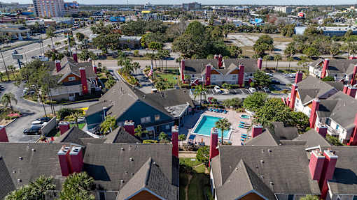 A bird's eye view of Fusion Orlando Apartments and a swimming pool.