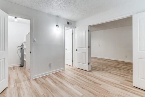 Micro apartments in Haltom City, TX for Rent - Fusion Fort Worth Apartments - Renovated Interior with Hardwood Inspired Flooring