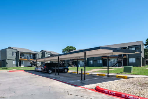 Apartments with covered parking spots at fusion fort worth apartments in haltom city, Texas