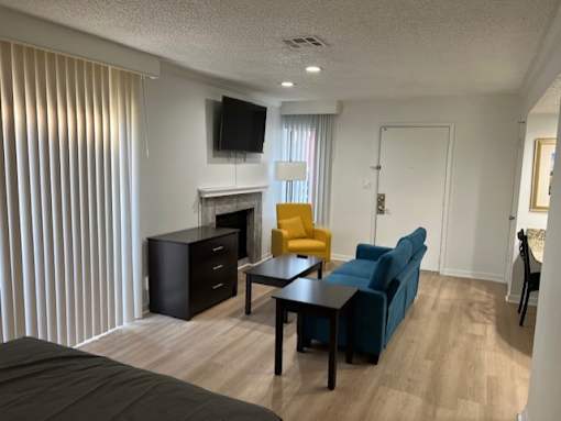 a living room with a couch and a table