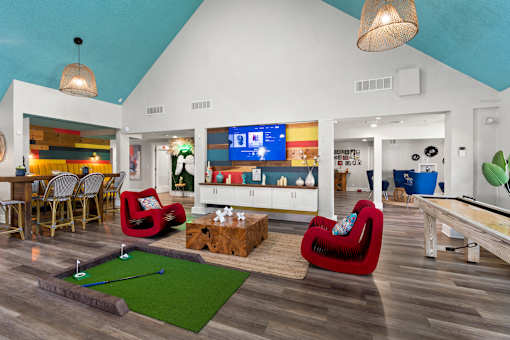 Fusion Orlando apartments clubhouse with a miniature golf course in the middle.