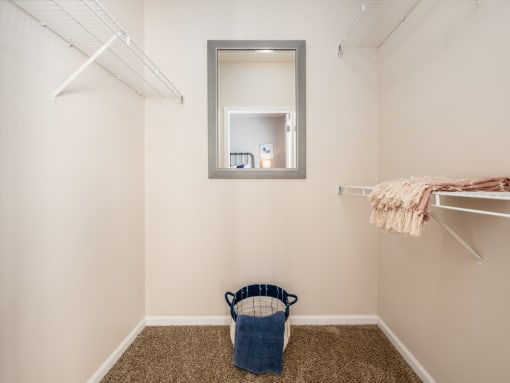 Spacious walk-in closet, ideal for extra storage, located in a Catalina Club apartment.