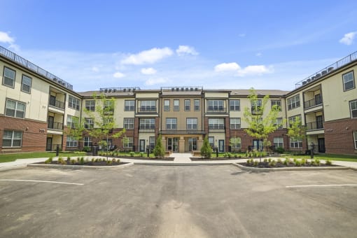 Beautiful and well-lit landscaping surrounds the exterior with plenty of parking available.