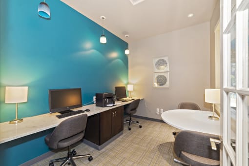 The business center at Austin Park Apartments offers complimentary computer access for residents who work from home.