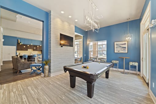 The game room in the renovated clubhouse includes a pool table for resident recreation.