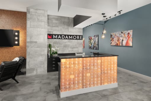 a rendering of the madam more reception desk