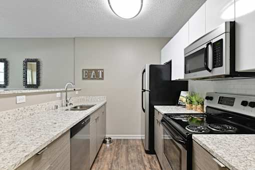Patchen Oaks Apartments - Updated Kitchens with Stainless Steel Appliances