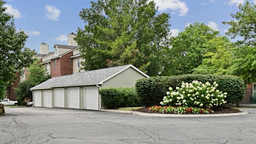 Patchen Oaks Apartments - Exterior Green Spaces & Garages