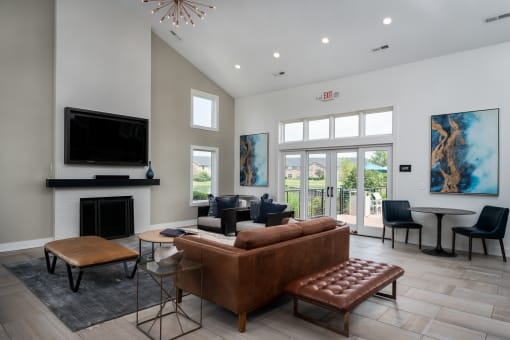 the estates at tanglewood|living room with fireplace and television