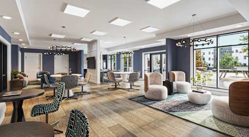 A modern interior with a variety of seating options and a view of the outdoors.