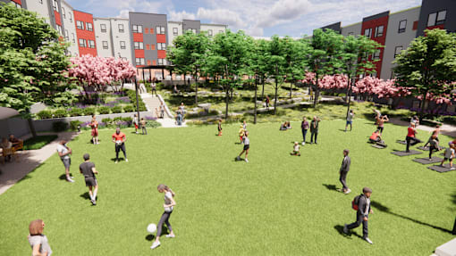 A group of people playing soccer in a park.