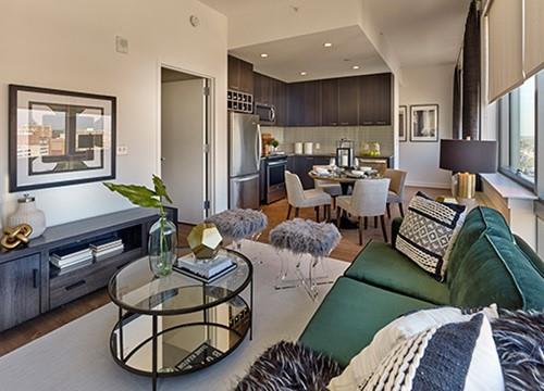 a living room with a couch and a table