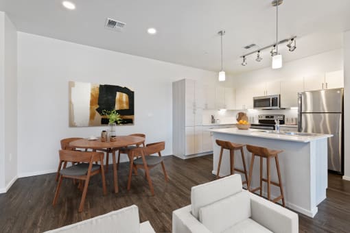 living space with kitchen and dining table