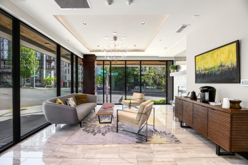 a living room with couches and chairs and a coffee table