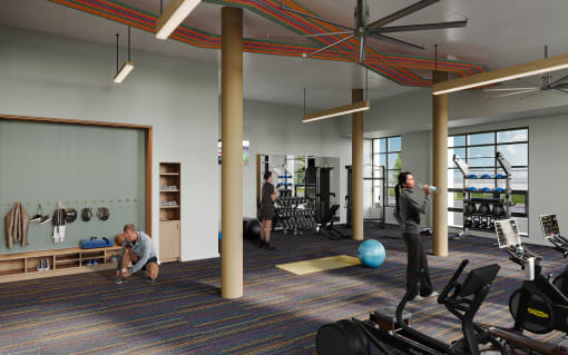 Studio Apartments in Eugene, OR - Heartwood - Fitness Center with Exercise Equipment, Windows, and Ceiling Fan