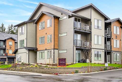 Apartment building with a sign that says "Pinehurst".
