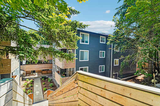 A view of a courtyard surrounded by buildings.