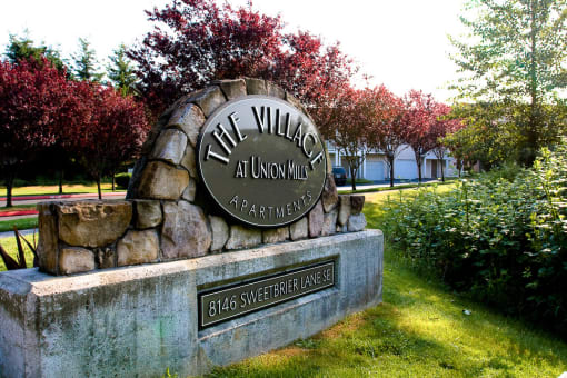 a sign for the willow at lincoln mall apartments