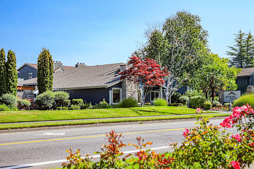 A house with a grey roof and a sign that says "Lakeview".