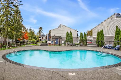 the preserve at ballantyne commons pool and spa with apartment buildings