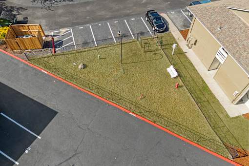 A parking lot with a car parked in it.
