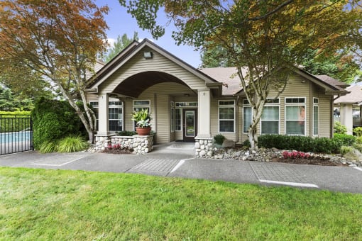a house with an archway on the front of it