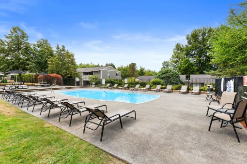 our apartments have a resort style pool with chaise lounge chairs