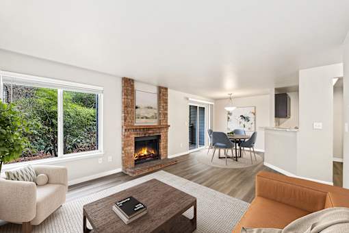 A living room with a fireplace and a couch.