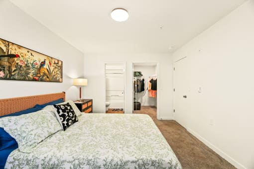 a bedroom with a bed and a closet