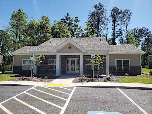 A small building with the number 185 on it.