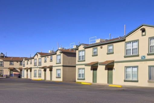 a row of houses in a parking lot
