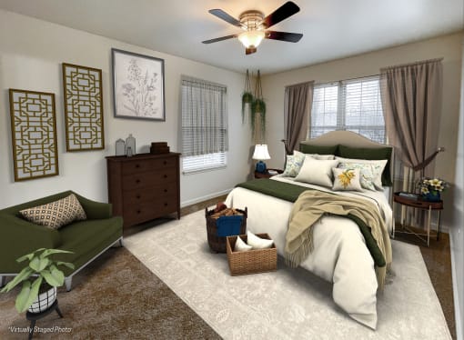 a bedroom with a bed and a ceiling fan