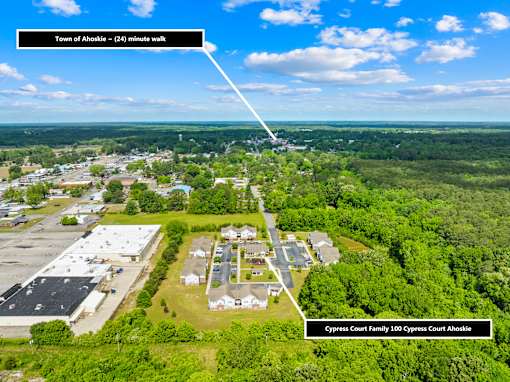 An aerial view of a town with a highlighted area indicating the location of the Cypress Court Family 100.