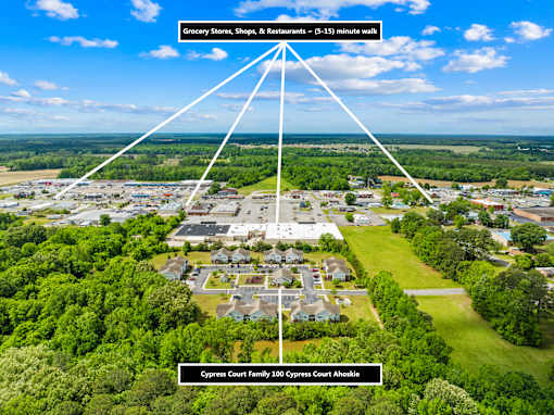 An aerial view of a residential area with a label pointing to a house named Cypress Court Family 100.
