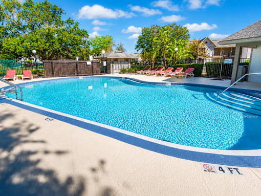 A small pool with a 4ft depth marking.