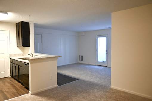 A room with a counter and a window.